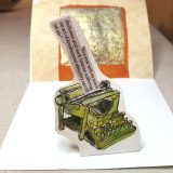 ‘Kindhearted Absurdity‘Typewriter Popup CardWC & ink/watercolor paper with mixed media card